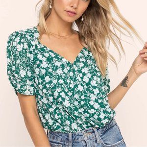 ASTR WRAP FRONT SHORT SLEEVE FLORAL BODYSUIT, SIZE MEDIUM